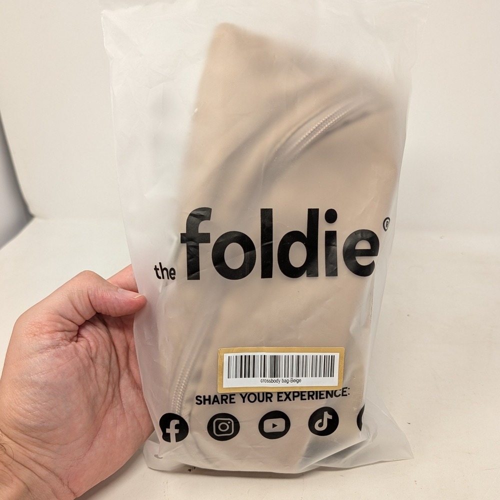 The Foldie Crossbody Bag Beige Nylon Travel Waist Pack Adjustable Strap